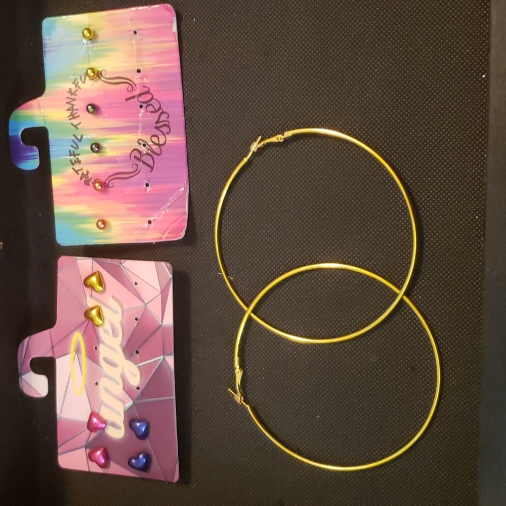 3 pairs of HEART studs 3 pairs of BALL studs and 1 pair of lg HOOPS earrings.